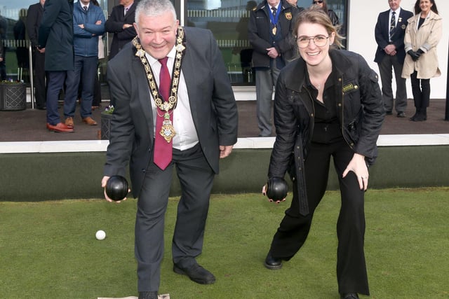 Dehenna Davison, Parliamentary Under-Secretary of State for the Department for Levelling Up, Housing and Communities, and the Mayor of Causeway Coast and Glens Borough Council, Councillor Ivor Wallace try out some bowling during the event at Portrush Recreation Grounds.
