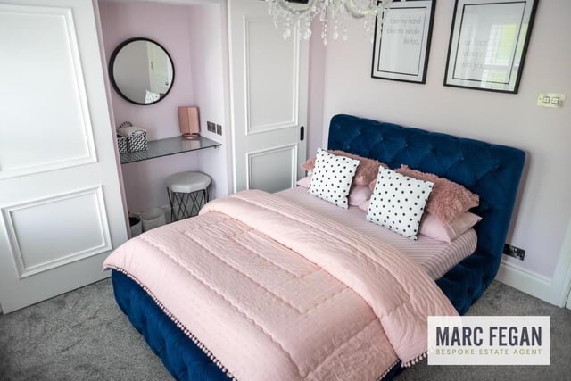 This fabulous home has four bedrooms, all with their own or shared bathrooms.