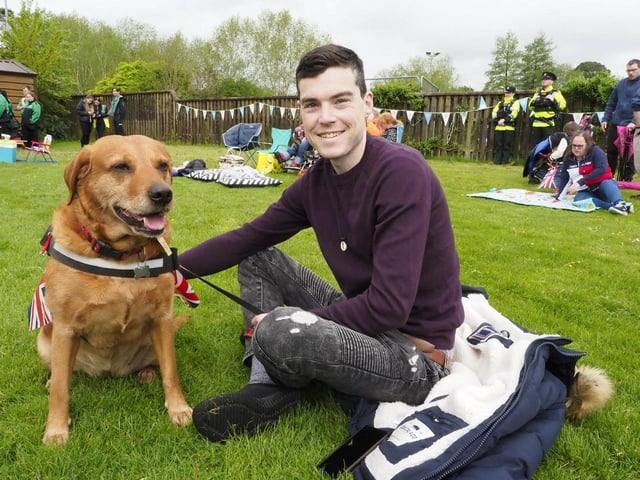 A canine companion joins in the fun at the People's Park.