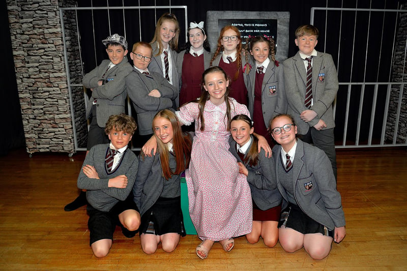 Miss Honey, played by Ruby Patton, and her pupils in the Lurgan Junior High School version of 'Matilda'. PT25-241.