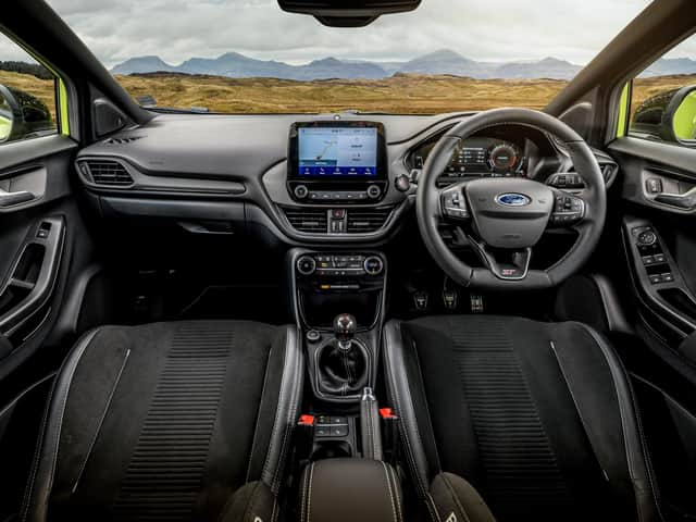 The Ford Puma ST's interior adds some sports seats and other ST-themed detail to the regular Puma interior