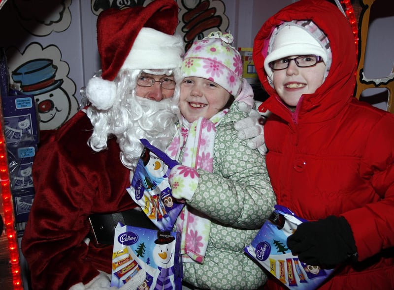 Iona and Athena Dunlop meet Santa at the switch on of the Christmas Lights in Portstewart in 2010