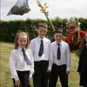 St Nicholas' Primary School pupils Amy Drury, Peter Dillon, Conor Taggart and Alice McQuillan attended the 2007 launch of Carrick in Bloom at the Andrew Jackson Centre. Ct21-066tc