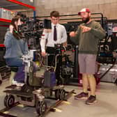 Northern Ireland film grip Donavan Gallagher pictured at Panavision Belfast with Cara from Friends School Lisburn and Aaron from Belfast Royal Academy learning how to work the equipment on a film set. Credit: Submitted
