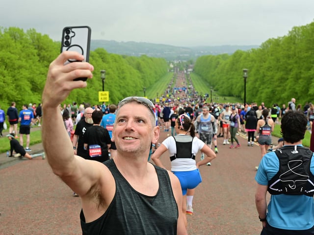 Enjoying the atmosphere of the annual Belfast City Marathon.