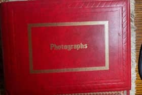 The cover of the photo album which was left behind in a  Howard Johnson’s Hotel in Winter Haven, Florida.