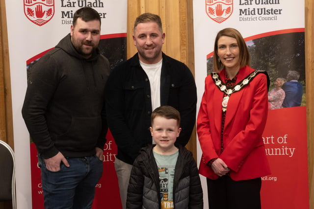 Pictured at the Civic Awards with Chair of the Council, Councillor Córa Corry, is Gareth Devlin who was selected in the Gaelic Life Ulster Football All Star Team. Gareth was also named the top scorer in the 2022-23 All-Ireland Junior Club Football Championship. Also pictured is nominating Councillor, Councillor Dan Kerr.