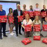 Staff from Heron Bros pictured at the recent CPR training session in Draperstown. Included, are Head of BHFNI Fearghal McKinney, standing, third from left, and Caroline Hughes, Heron Bros, kneeling on left. Pic: BHFNI.