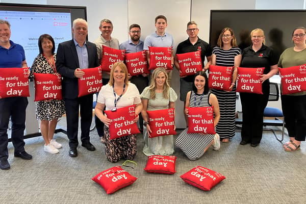 Staff from Heron Bros pictured at the recent CPR training session in Draperstown. Included, are Head of BHFNI Fearghal McKinney, standing, third from left, and Caroline Hughes, Heron Bros, kneeling on left. Pic: BHFNI.