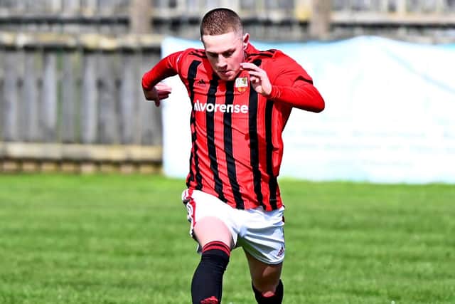 Conor McNally surges forward.