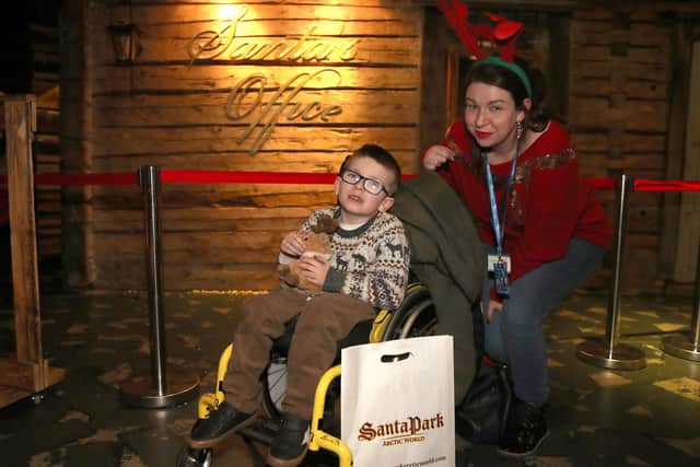Odhran Fleming and mum Nicole Young from Coleraine in Lapland