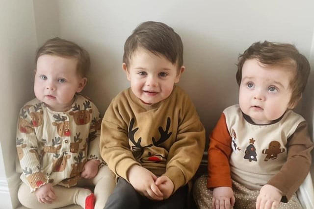 James telling his little brother and sister Noah and Katie all about Christmas. Picture: Tricia Mc Cann