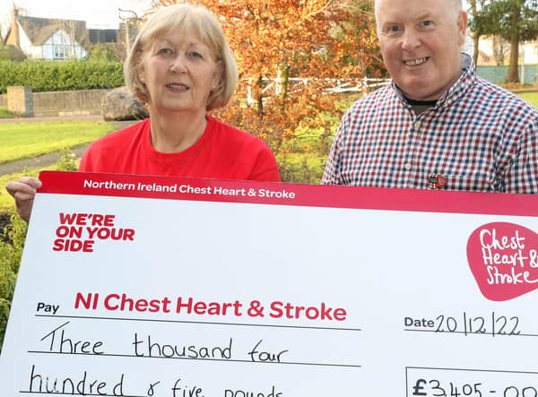 Baylon McCaughey pictured with Valerie Saunders, Area Representative for Northern Ireland Chest Heart and Stroke, who received a cheque for £3,405 from Baylon, the proceeds of badge sales for the charity. Photo: Norman Bell.