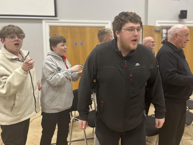Pictured in rehearsals for Ballywillan Drama Group's production of Fiddler on the Roof are Patrick Connor and some of the male ensemble.
