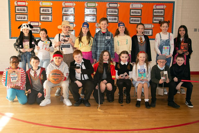 Getting into the spirit of World Book Day are senior pupils of St John the Baptist Primary School. PT10-248.