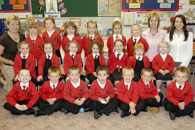 The new primary one intake at Cope Primary school, Loughgall were all smiles when our photographer called to record their first days at school in 2007.  Also included in the photo are P1 teachers Mrs Denese Wright, left and Miss Sarah Ballentine, right with classroom assistant Mrs Morag Walker, second from right.