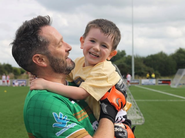 Big hugs for the goalkeeper at Lurgan Against Racism 5-a-side tournament and fun day at Knockramer Park.