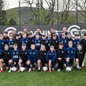 Young players and coaches from Shankill Juniors FC and St Oliver Plunkett FC U13s pictured ahead of their joint trip to the prestigious Holland Cup in April 2025 as part a cross-community initiative uniting two of Belfast’s leading grassroots clubs through football, friendship and shared ambition.