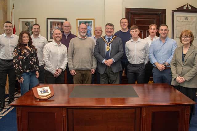 The Mayor of Mid and East Antrim, Alderman Noel Williams, with Paul McClinton and council staff.