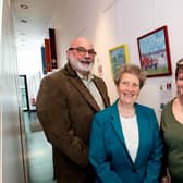 Dementia NI Members, from left,  Davie McElhinney, Yvonne Thompson and Allison Batchelor share artworks challenging misconceptions about dementia. Credit: Submitted