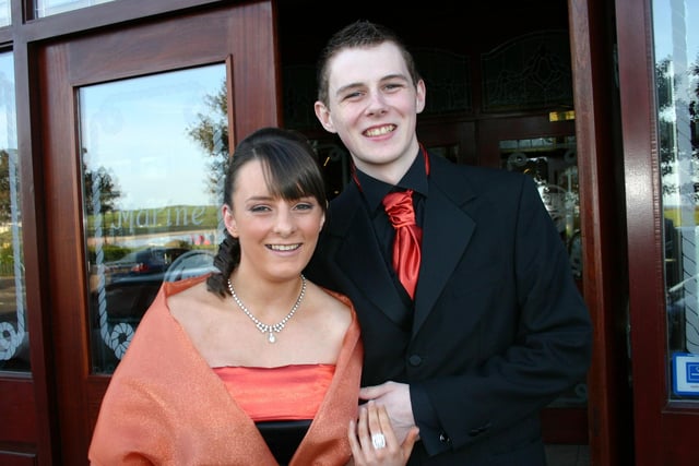 All smiles for the camera at their Cross and Passion formal in 2006