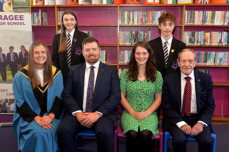 Platform party members at the Tandragee Junior High School prize day including back row from left, Abby UpRichard, head girl and Daniel Robinson, head boy. Front from left, Mrs Laverne Inns, vice principal, Mr Andrew McNabb, special guest; Mrs Clare McNabb and Mr Roy Leckey, chairman of the school govenors. PT44-201.