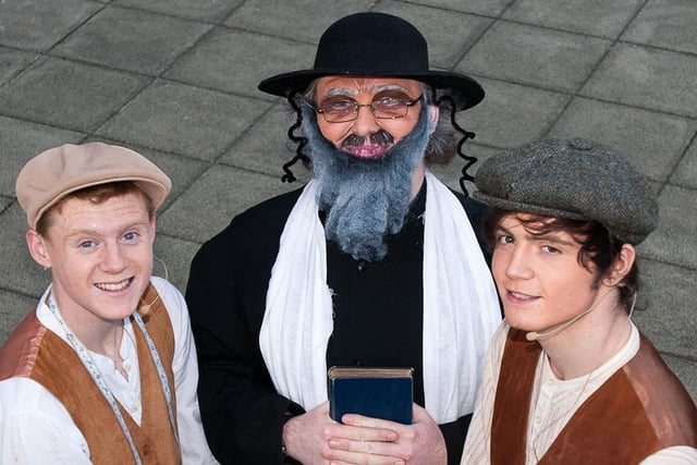 Boyd Rodgers, Ryan Maxwell and Zach Troughton preparing to play their roles in the Wallace High School production of Fiddler on the Roof in 2010