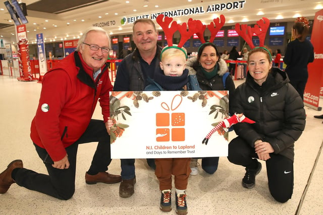 Colin Barkley, Chair of NI Children to Lapland and Days to Remember Trust with Hubert and Linda Taylor and  Quinn Callaghan with mum Marissa.