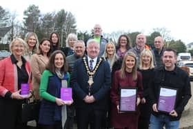 Mayor of Causeway Coast and Glens, Councillor Steven Callaghan join members of the Causeway Healthy Kids Programme, Jill Stewart, Sabrina Lynn, Nicola Arbuckle, Gareth Scott, Jill Bradley, Stephen McCartney, John Fall, Bebhinn McKinley, Roger Downey, Zara Lynch, Wendy McCullough, Petra Corr (Director of Mental Health, Learning Disability and Community Wellbeing), Clare Galway (Paediatric Health Improvement Dietitian), Sandra Anderson (Health & Wellbeing Manager) and Jonny McFadden. CREDIT CAUSEWAY COAST AND GLENS COUNCIL