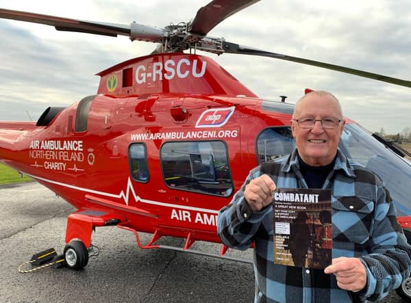 Rodney Houston visiting the Air Ambulance Northern Ireland base in Lisburn to promote his new book, 'Combatant'.