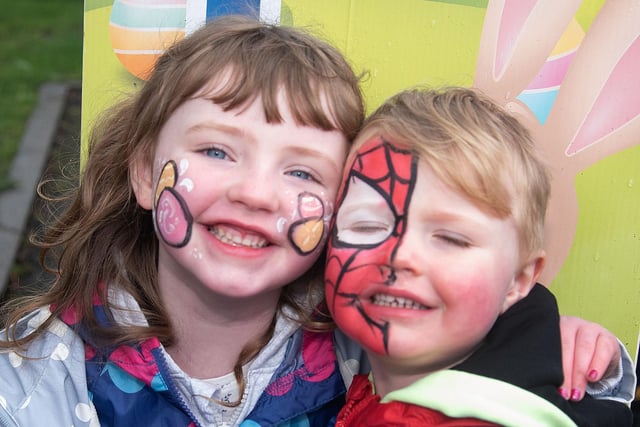 Molly Devlin (5) and and ittle brother, Daithi (2) showing off their painted faces at the Lord Mayor's Easter Trail and fun day. PT13-263.