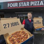Store owner, Darren Colgan celebrates the opening of Four Star Pizza, Ireland’s biggest indigenous pizza company, Craigavon location following an £80,000 investment that will create 27 jobs locally and breathe new life into the Lake Road area, where the store is located.