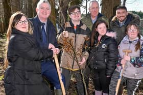 Young Lisburn people help the Housing Executive care develop a pocket forest for the community