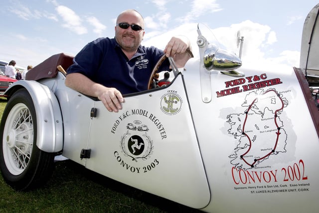 Paul Mullan pictured with his late father's 1937 Model Y Special during the Ford Fair at the Dunluce Centre in 2009.