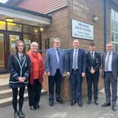 Education Minister Paul Givan with Principal Ian McConaghy, members of the Board of Governors, Head Girl and Head Boy, during a visit to Dromore High School.