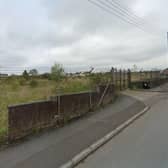 The Lurgan site where the townhouses are going to be built is a large vacant plot currently overgrown. Credit: Google