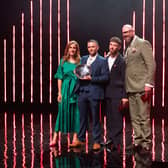 Actor, James Nelson-Joyce, and comedian, Tom Davis, take to the stage at Royal Festival Hall for The King’s Trust Awards 2025 to celebrate Harry, 23, winner of the Homesense Young Achiever of the Year award.