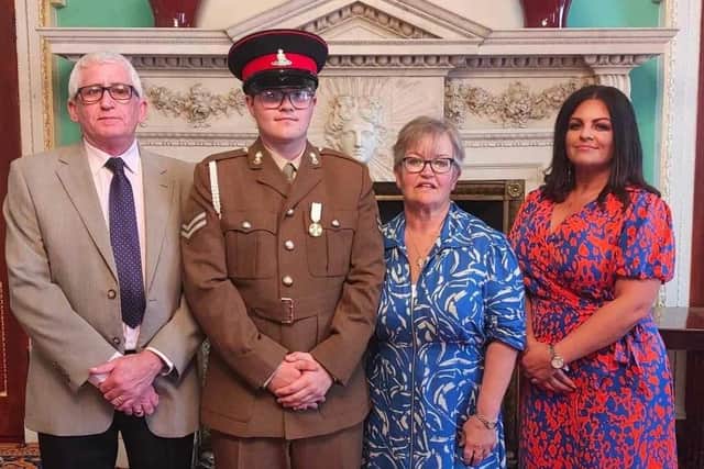 Marley Shaw (Second left) at the award presentation in Mansion House in London with (from left) his grandfather Samuel Crawford, grandmother Carol Crawford and mother Louise Shaw. Credit Louise Shaw