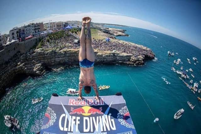 The PSNI has issued travel advice ahead of The Red Bull Cliff Diving World Series in Ballycastle. Credit: Romina Amato/Red Bull Content Pool