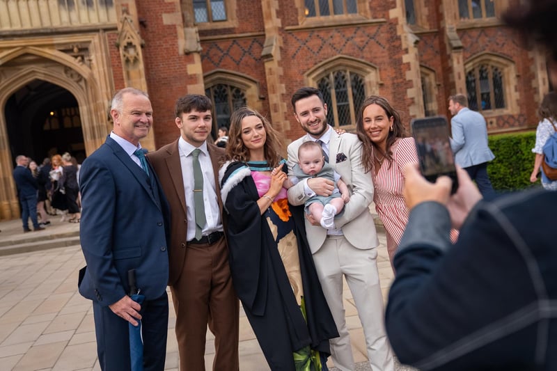 Nicole Geddis from Dromore celebrates with family after receiving a BA English degree.