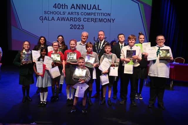 Deputy Mayor of Lisburn & Castlereagh City Council, Councillor Gary McCleave and Communities and Wellbeing Chairman, Councillor Thomas Beckett with winners at the Schools' Art Competition gala awards ceremony. Pic credit: Lisburn and Castlereagh City Council