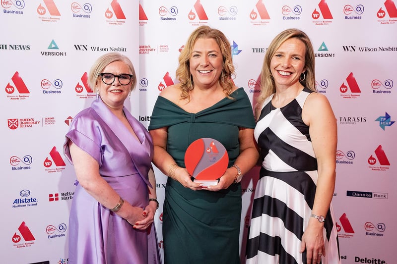 Lisburn-based Louise Crothers, manager at R L Services Plant Hire and Training, who took home the award for Best Customer Service (Small Business), with Sinead Cavanagh, from award sponsor Irish News and Lorraine Acheson, managing director Women in Business.