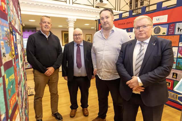 At the launch of the exhibition is Cllr Jonathan Craig, Chair of LCCC’S Leisure & Community Wellbeing Committee, with Kenny Donaldson (SEFF), Paul Allison (Lisburn Museum) and Michael Bingham, QGM who spoke about the murder of his family in Dromore, 1976. Pic credit: LCCC