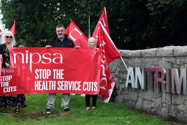 Health workers protest outside Antrim Area Hospital on Thursday morning. Picture: Stephen Davison / Pacemaker