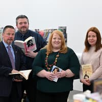 Justice Minister Naomi Long marks Book Week NI at Hydebank Wood