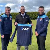 From left umpire Brian Alexander (NIACUS), Darren Leslie (PAC Group) and Gareth Morrison (NIACUS)