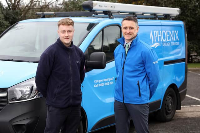 Head of Phoenix Energy Services, Neil Boyce (right) with Phoenix Energy Services emergency engineer Harvey Joyce (left),  who has recently been promoted following the successful completion of the Phoenix Gas apprentice training programme.