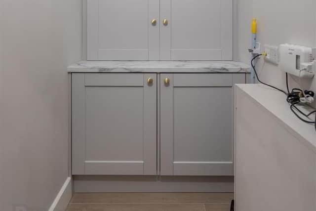 The utility area has 'Shaker' style fitted units.