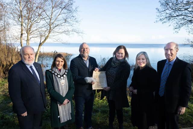 Gerry Darby of Lough Neagh Partnership is pictured celebrating the signing of the transfer of the Derrytresk and Derryloughan School Lands lease with Francie Molloy MP; Cora Corry, Chair of Mid Ulster District Council; Anne McConkey, Department of Education; Michelle O’Neill MLA and Chair of Lough Neagh Partnership, Arnold Hatch. Pic: John O'Neill