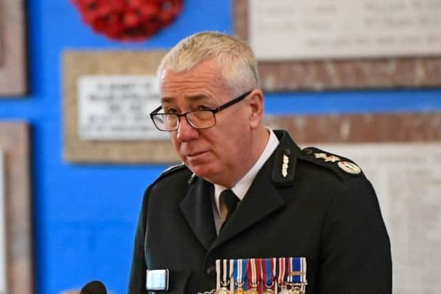 PSNI Chief Constable Jon Boutcher gives a reading at the 40th anniversary service to remember the nine RUC officers murdered in an IRA attack in Newry in 1985. Photo: Pacemaker Press
